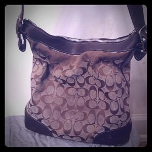 An authentic crossbody Coach purse